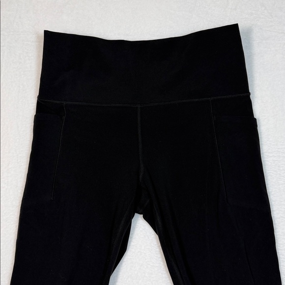 Athleta Women’s Black Mesh Salutation Leggings size Medium with pockets - Picture 6 of 8
